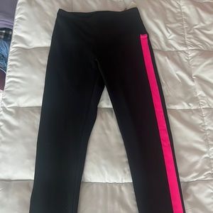 PINK black leggings with highlights of pink on the side. Size small, brand new!